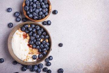 Breakfast with yogurt, blueberries and granola