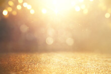 Background Of Abstract Gold And Silver Glitter Lights. Defocused