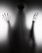 © erika8213 - Shadow blur of horror skeleton. Halloween background.
