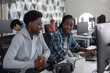 © ReeldealHD images - High school students computer programming in class