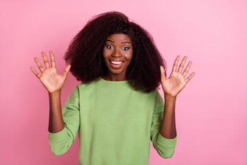 Sticker - Photo of cheerful pretty girl raise opened arms palms toothy smile isolated on pink color background