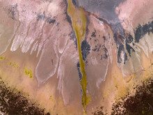 Aerial View Of Colourful Patterns And Textures In A Dry Salt Lake