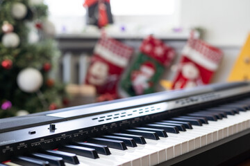 Wall Mural - Piano keyboard with Christmas decoration, closeup