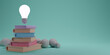 © Atlantist studio - 3D rendering of Light bulb, Symbol of the idea over color books on pastel background