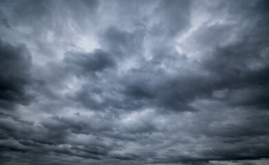 Wall Mural - dark storm clouds with background,dark clouds before a thunder-storm.