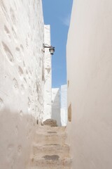 Poster - Narrow stairway in an old town on Astypalea Island, Greece