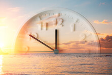 Beautiful Sunset Sky, Ocean And Close Up Of Clock. Double Exposure. Copy Space. Concept Of Daylight Savings Time