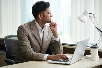 Wall Mural - dreamy businessman looking through window