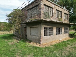 Wall Mural - 
Aerial view of World war two military airfield control tower at Forma RAF Woolfox Lodge Aerodrome. Rutland, England. Royal Air Force Woolfox Lodge or more simply RAF Woolfox Lodge 