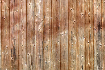  Old and dirty wall made of the wooden panels with multiple knots as a background