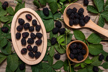 Wall Mural - Blackberries on a old wooden table