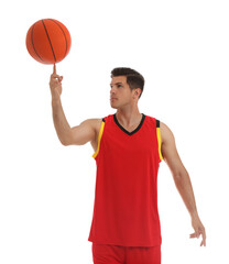 Wall Mural - Basketball player spinning ball on finger against white background