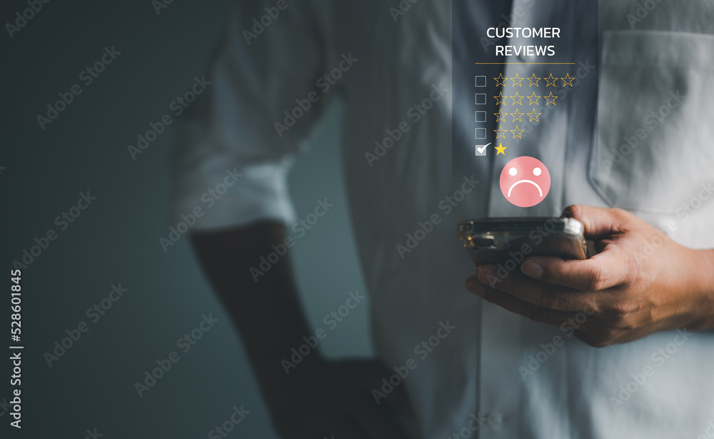 Customer Experience dissatisfied Concept, Unhappy Businessman Client with Sadness Emotion Face on smartphone screen, Bad review, bad service dislike bad quality, low rating, social media not good...