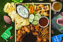 Overhead View Of A Party Tray Of Healthy And Fun Snacks And Sauces For A Fun Tail Gate Party Time With Family And Friends For Football Season.