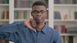 © stockbakers - Young African Man showing Thumbs Down Gesture