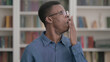 © stockbakers - Tired Young African Man Yawning