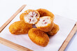 Tapa of croquetas or croquettes	on white background 