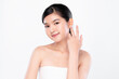 © kitthanes  - Beautiful young asian woman with clean fresh skin on white background, Face care, Facial treatment, Cosmetology, beauty and spa, Asian women portrait.