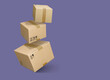 Cardboard parcel boxes falling on violet purple background