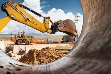 excavator digs piles. earthworks for the construction of the foundation. construction equipment for 