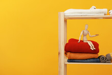 Wooden Shelving With Clothes, Autumn Season Clothes