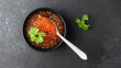 Red salmon caviar with parsley in a bowl