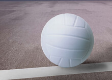 White Volleyball Near The White Line On The Court Background