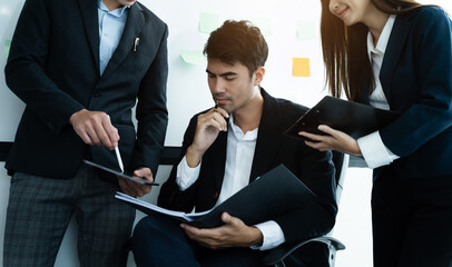 Business people discussing on performance revenue in meeting. businessman working with co-worker team. financial adviser analyzing data with investor at office.