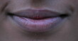 Leinwandbild Motiv Close-up of african american woman mouth and lips smiling