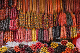 Fototapeta  - Bunches of different delicious churchkhelas at market