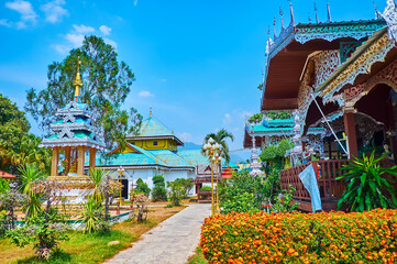 Sticker - The blooming garden of Wat Chong Kham Temple, Mae Hong Son, Thailand