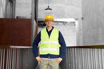 Sticker - architecture, construction business and building concept - happy smiling male builder in helmet and safety west at office