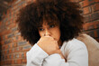 © M Einero/peopleimages.com - Fear, sad or depression of a young woman sitting with depressed expression or thinking of a problem. Worried and alone african American woman after a bad fail, anxiety or mental health issues