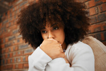 Fear, Sad Or Depression Of A Young Woman Sitting With Depressed Expression Or Thinking Of A Problem. Worried And Alone African American Woman After A Bad Fail, Anxiety Or Mental Health Issues