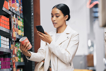 Supermarket, customer and price check on smartphone to compare product cost on ecommerce app. Grocery shop inflation and increase in spending money with essential lifestyle consumables.