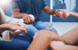 © Deen Jacobs/peopleimages.com - Community, diversity or psychology support holding hands in mental health workshop, mind or help meeting. Zoom on men, women or people in friends trust circle with psychologist for hope or motivation