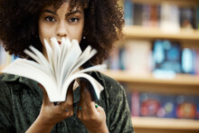 Scholarship, Books And Girl Student In Library Learning, Studying And Reading Educational Knowledge Or Information. Young, Smart And Afro Black Woman On University Or College Campus With School Novel