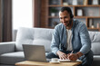 © Prostock-studio - Remote Education. Happy Black Man In Headset Study With Laptop At Home
