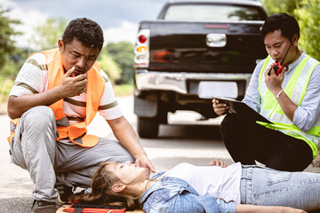 rescure team radio calling help support women victim hit by car at roadside accident scene