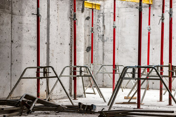 Formwork supports the second floor of a monolithic building. Reinforcement of walls and ceiling. Monolithic work during the construction of a building close-up. construction technologies.