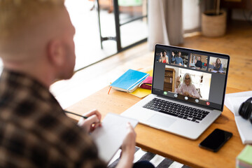 Poster - Albino african american businessman having video call with colleagues