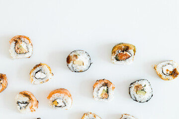 Wall Mural - Sushi Rolls Set, maki, philadelphia and california rolls, on a white background.