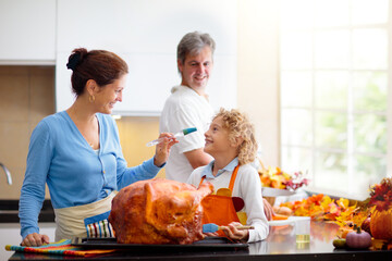 Wall Mural - Family cooking Thanksgiving dinner