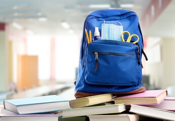 Wall Mural - School classroom. New school bag on a student's desk in the classroom. Back to school concept