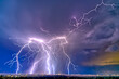 © SuperStock - A burst of lightning bolts over the Arizona town of Chino Valley during the 2022 Monsoon season.