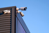 Fototapeta Do przedpokoju - A review of surveillance cameras on white background. Security concept. Facial recognition. Program search for criminals.