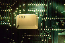 Close-up Of The Help Key On A Circuit Board