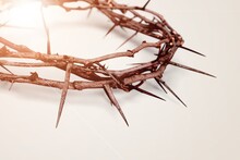 Crown Of Thorns Symbolizing The Sacrifice, Suffering And Resurrection Of Jesus Christ On The Cross And Easter Bright Background