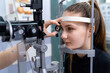 Professional eye examination. Ophtalmology checking eye vision.