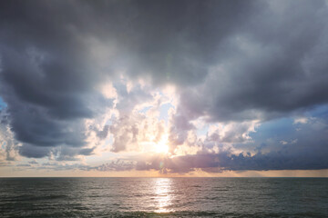 Wall Mural - picturesque view of sky with heavy rainy clouds over sea